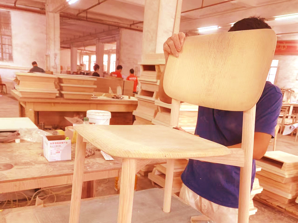 Solid wood furniture manufacturing at Dejell factory workshop