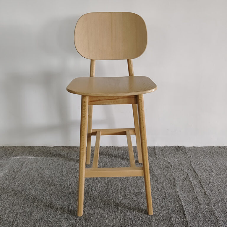 Scandinavian beech wood bar stool with curved back and solid wood legs by Dejell