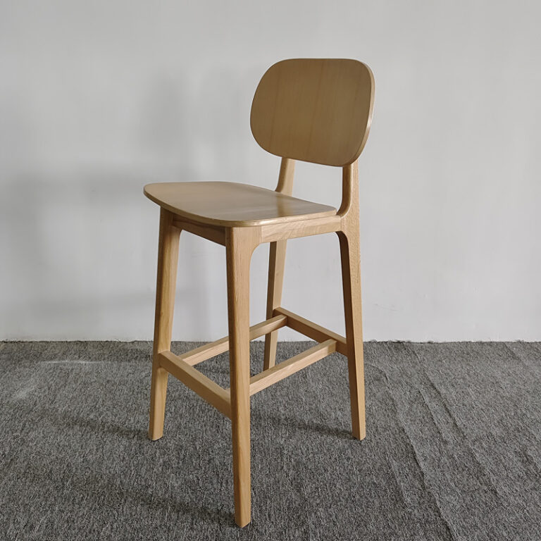 Beech wood bar stool contoured seat and ergonomic curved backrest detail