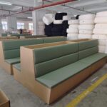 Multiple restaurant booth seating units in production at Dejell factory