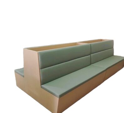 double-sided restaurant booth seating with sage green upholstery and wood frame by Dejell