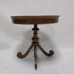 Turned center column and cabriole legs detail of ash wood round side table