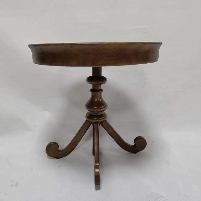 Turned center column and cabriole legs detail of ash wood round side table