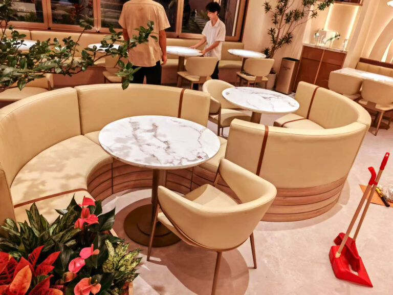 Custom curved booth seating with integrated planter trough in Shenzhen restaurant by Dejell