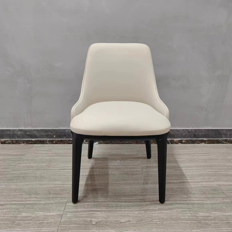 Cream white upholstered dining chair with curved wraparound backrest and solid wood frame by Dejell