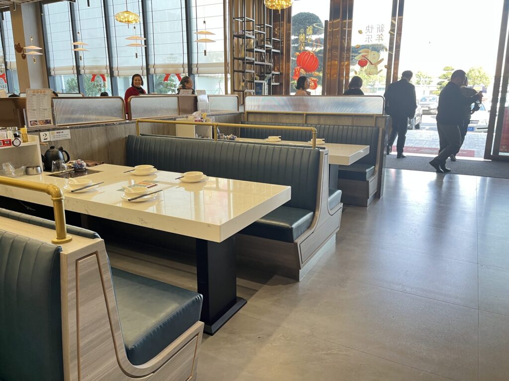 Restaurant entrance with booth seating