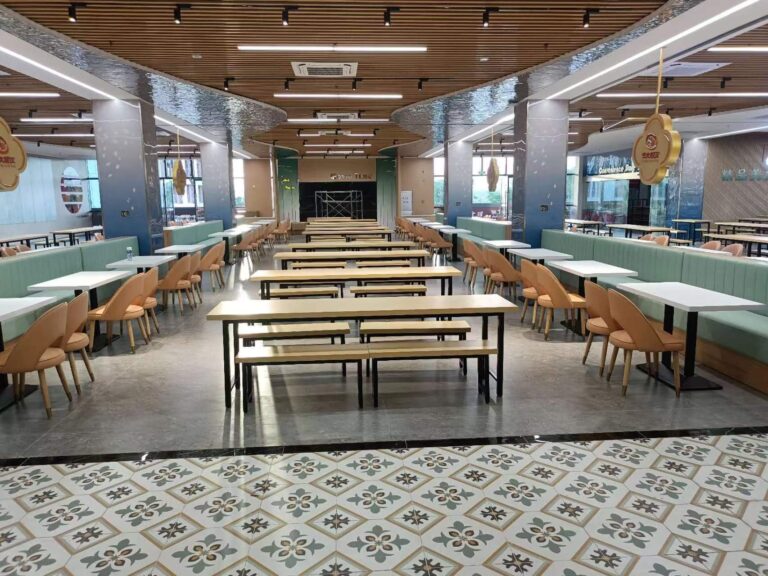 Main dining hall of Hainan University Dining Hall No. 1 with communal tables and green booths