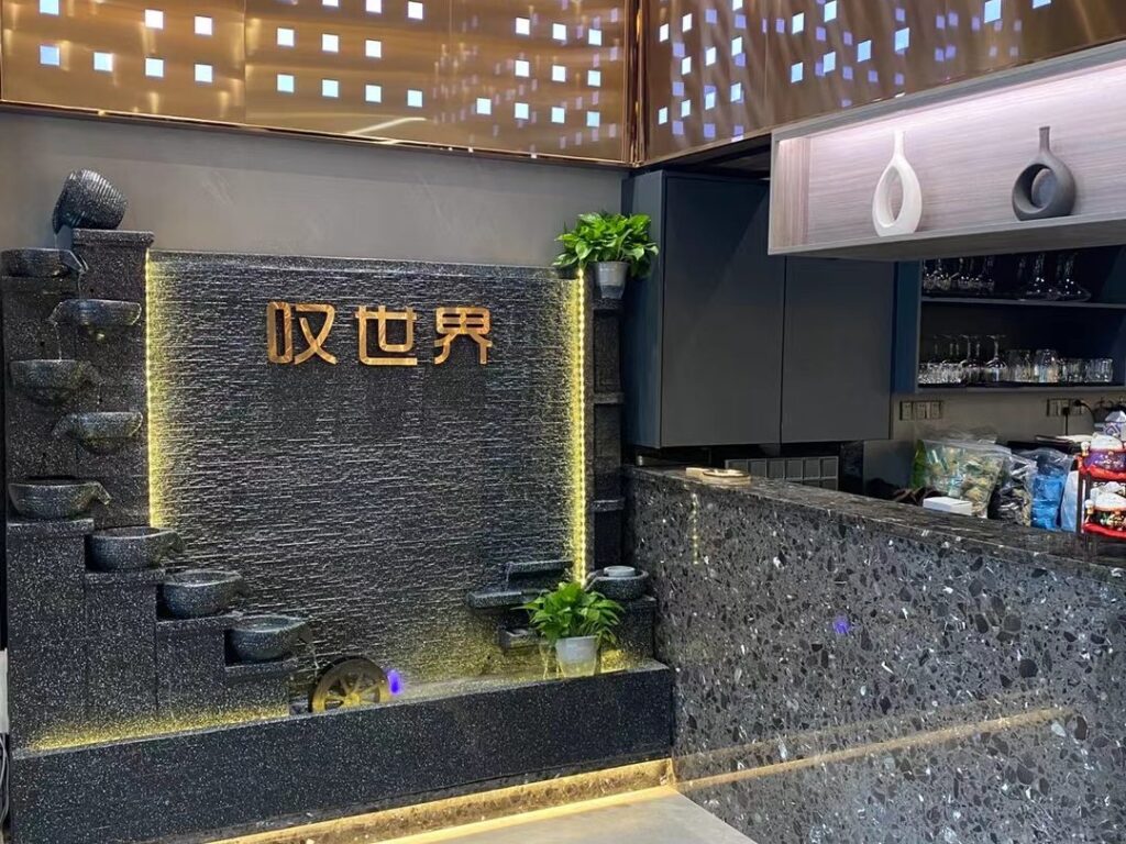 Tan Shijie restaurant storefront sign